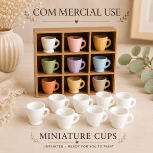 May include: A brown nine-compartment display shelf containing nine miniature cups in various pastel colors, including white, pink, yellow, green, purple, blue, orange, and tan, with nine additional white miniature cups arranged in front of the shelf.