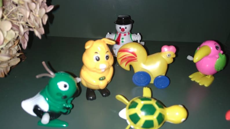 bunny toucan. turtle snowman Variety of animals chicken Basket Easter egg fillers Cricket owl They work Lot 7 Vintage Wind Up Toys