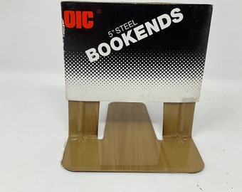 Pair vintage faux bois wood grain metal industrial bookends. Never opened,