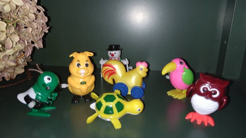 bunny toucan. turtle snowman Variety of animals chicken Basket Easter egg fillers Cricket owl They work Lot 7 Vintage Wind Up Toys