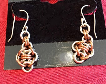 Sterling silver and copper dangle earrings. Japanese 12 in 2 chainmail pattern. Sterling silver ear wires. Handmade