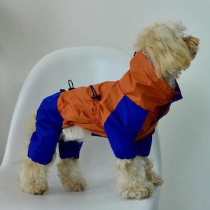 Waterproof Dog Raincoat with Adjustable Fit and High Collar Hood – Unisex Design