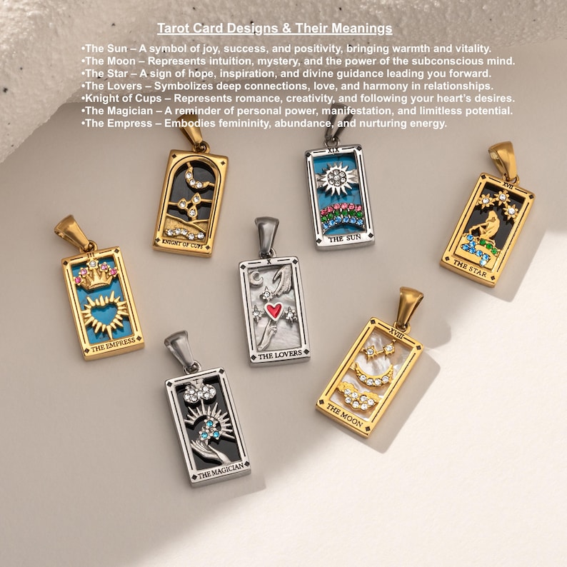 May include: A set of ten gold and silver pendants featuring tarot card designs. Each pendant is a rectangular charm with a different tarot card image, including The Empress, Knight of Cups, The Sun, The Star, The Magician, The Lovers, and The Moon.