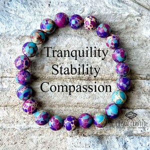 Close-up of the Sea Sediment Jasper bracelet displaying intricate bead patterns with "Tranquility, Stability, Compassion" text overlay. A perfect mindfulness gift.