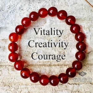 Close-up of the Carnelian bracelet, emphasizing its rich color and energy-enhancing properties with the words "Vitality, Creativity, Courage" overlaid.