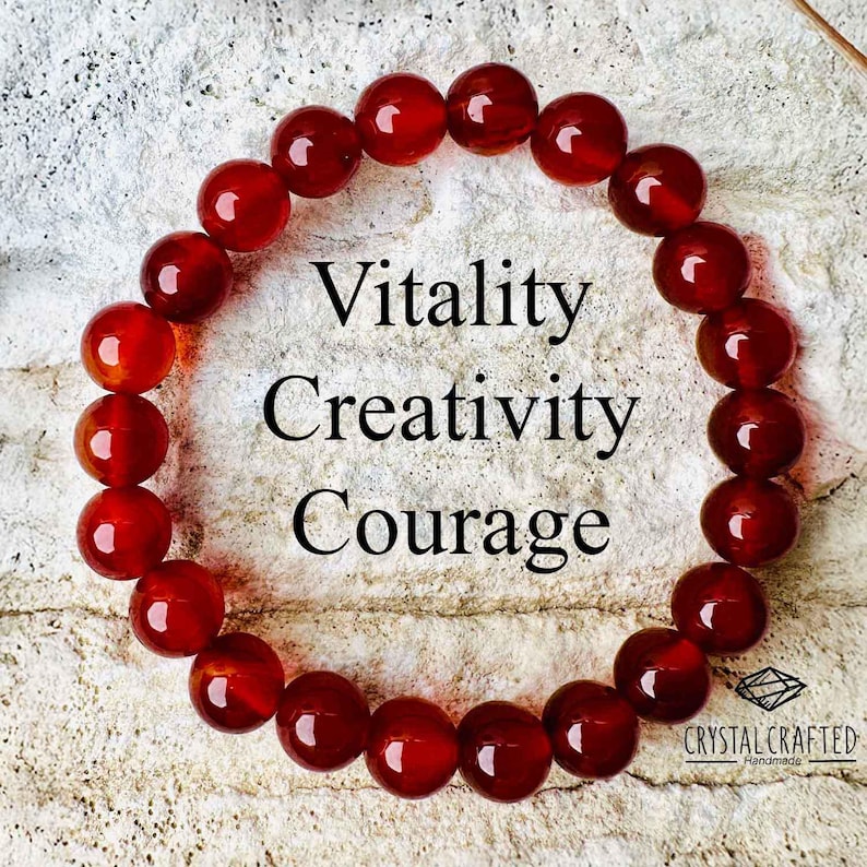 Close-up of the Carnelian bracelet, emphasizing its rich color and energy-enhancing properties with the words "Vitality, Creativity, Courage" overlaid.