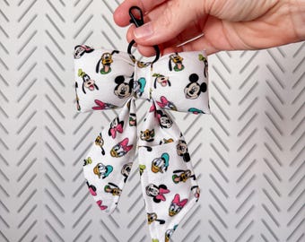 Charm de sac sensationnel à six nœuds | Bijou de sac baume à lèvres
