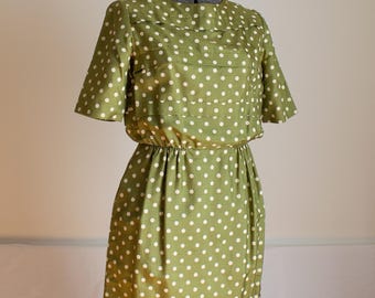 Vintage 1960s size XS wiggle dress with green and cream silk polka dots: short sleeves, blouson top, and knee length pencil skirt