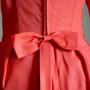 True vintage 1950s Lorrie Deb San Francisco salmon pink fit and flare cocktail party dress with pink tulle crinoline and matching headpiece
