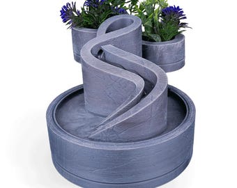 3D-geprinte fontein op tafel met plantenbakken: modern zen-bureaudecor