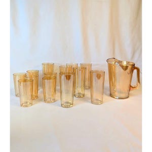 Jeannette marigold pitcher and 13 glasses vintage carnival glass ENTIRE SET EUC