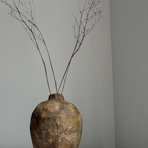 handcrafted paper mache vase, rustic nature-inspired bottle vase, organic mediterranean-inspired minimalist accent, sustainable decor