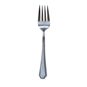 May include: A silver fork with four tines and a decorative handle. The handle has a geometric design and a hexagonal end. The fork is made of a shiny, reflective metal.
