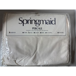 May include: A packaged Springmaid Percale bed skirt. The label reads "Springmaid Percale" with details about the fabric composition and available sizes: Twin, Full, Queen, King, and Cal King. The bed skirt is white and appears to be ruffled.