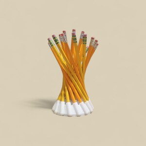 May include: A collection of yellow pencils with pink erasers and white tips, arranged in a spiral shape. The pencils are standing upright, creating a visually appealing display. The pencils are on a light beige background.