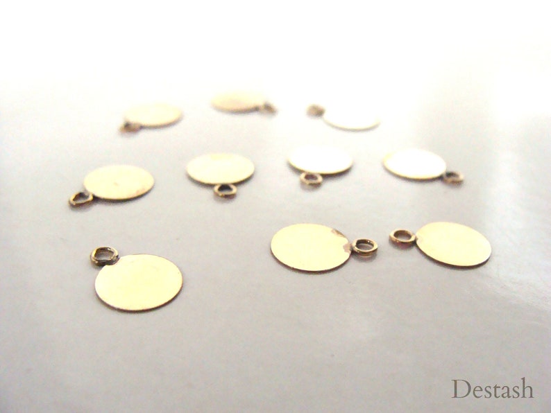 lightweight 7mm round flat charm with closed ring goldfilled tag destash jewelry making supplies Goldfilled charm sold in lot of 5