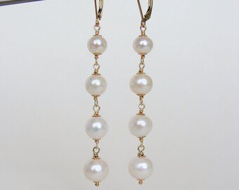 Long gold pearl earrings, statement, shoulder duster style, glam, handmade, celebration party prom wedding