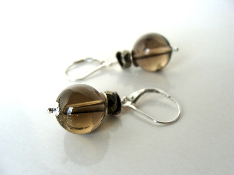 great for everyday large 10mm round quartz sterling silver accents and lever back wires Let Loose Jewelry Smoky quartz pyrite earrings