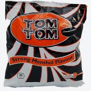 May include: A black and white bag of Tom Tom Strong Menthol Flavour candy. The bag has a red and orange stripe with the words "Tom Tom" in white letters. The bag contains 40 units of candy.