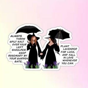 May include: A sticker featuring two figures in black dresses and hats, holding hands under black umbrellas. Text on the sticker reads, "Always throw spilt salt over your left shoulder, keep rosemary by your garden gate, plant lavender for luck, and fall in love whenever you can."