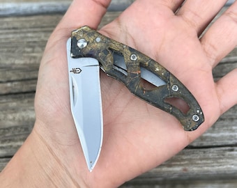 Cuchillo Gerber Paraframe Mini de segunda mano, color roble musgo.