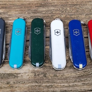 Gebrauchte Schweizer Taschenmesser Victorinox 58 mm Taschenmesser Classic SD Rot, Weiß Grün Schwarz Blau Gelb Pink Grau...gebraucht Zustand