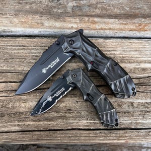 Pre-owned Smith & Wesson Black Ops Serrated Assisted Folder