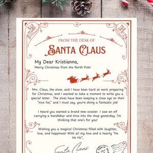 May include: A red and white Christmas letter from Santa Claus to Kristianna. The letter is decorated with a red border and a festive design. The letter reads "From the desk of Santa Claus" and "My Dear Kristianna, Merry Christmas from the North Pole!" The letter includes a message from Santa Claus about the elves working hard to prepare for Christmas and a special message for Kristianna. The letter is signed "Santa Claus" and includes the address "The North Pole".