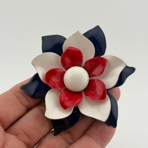 May include: A set of three ceramic mugs with a speckled, matte finish. The mugs are in shades of cream, light gray, and dark gray. Each mug has a simple, minimalist design, perfect for coffee or tea.