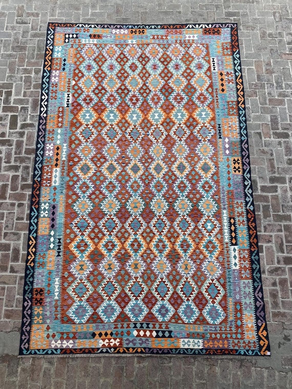 トルコキリムカラフルな幾何学模様のラグ