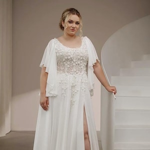 Modest chiffon wedding dress with flutter sleeves and decorative buttons