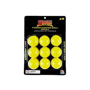 Op de afbeelding: Een verpakking met 9 gele schuimballen voor een Zurg Power Popper Ball navulling. De verpakking is zwart met de woorden "Evil Emperor Zurg" en "Power Popper Ball Refill" in geel. De verpakking vermeldt ook "Soft and Safe" en "x9".