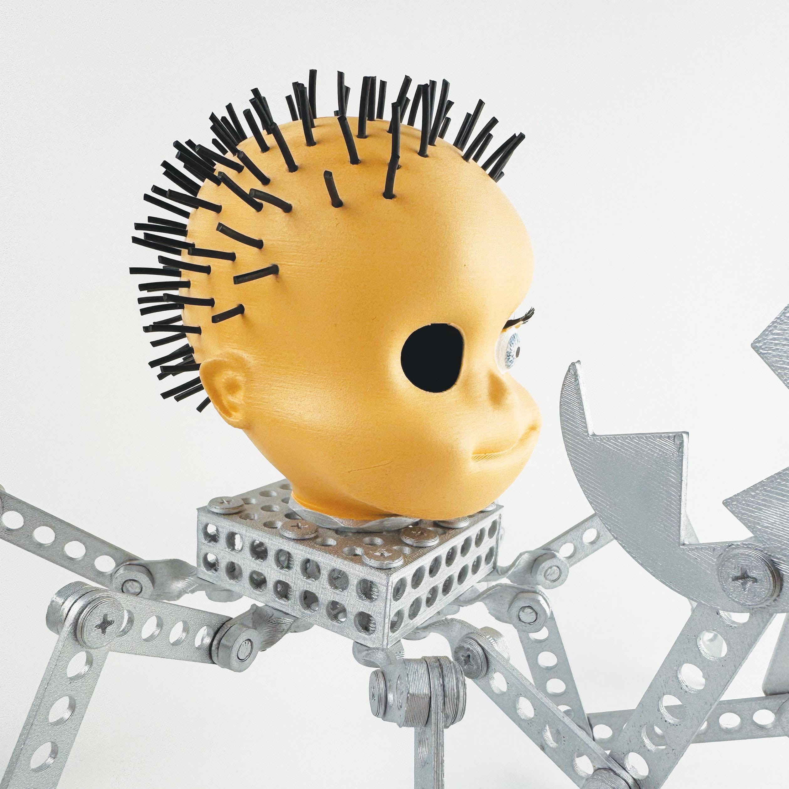 トイ・ストーリー（1995年）より、シドのミュータント・トイ「ベイビー