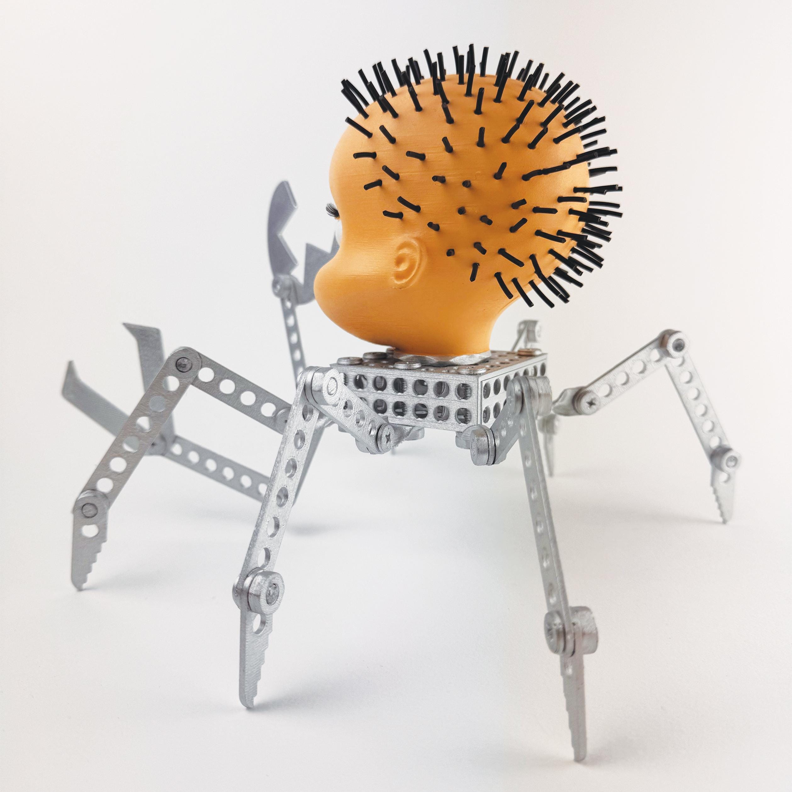 トイ・ストーリー（1995年）より、シドのミュータント・トイ「ベイビー