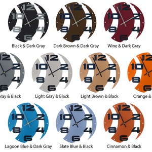 May include: A set of ten wall clocks with different color combinations. Each clock features a unique design with a swirling pattern and black numbers. The colors include black, dark gray, dark brown, light gray, light brown, wine, orange, lagoon blue, slate blue, and cinnamon.