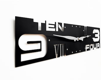 Sleek Horizontal Wall Clock | Modern Black Cutout Design | Outnumbered IV