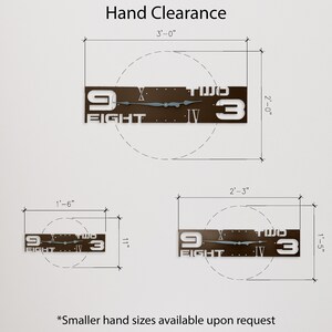 May include: Diagram showing hand clearance for a clock with a brown face and white numbers. The clock face reads "9 FIGHT TWO IV 3". The clock is shown in three sizes: 3 feet wide by 2 feet tall, 1 foot 6 inches wide by 1 foot tall, and 2 feet 3 inches wide by 1 foot 5 inches tall.