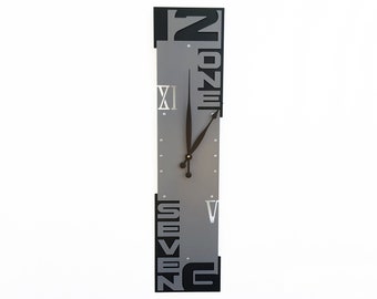 Modern Industrial Wall Clock | Vertical Gray and Black Design with Cut-Out Numbers | Unique Home Décor | Outnumbered VII