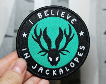 Jackalopia - 'I Believe In Jackalopes' Iron On Woven Patch 7cm