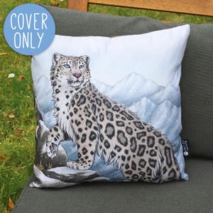 May include: Square throw pillow cover featuring a snow leopard illustration. The design shows a detailed depiction of the animal in a snowy mountain landscape. The pillow cover has the text "COVER ONLY" in a blue circle.