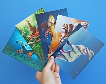 May include: Five illustrated cards featuring different animals. The cards are printed on white cardstock and feature a variety of colors, including blue, green, yellow, orange, and purple. The animals include a tiger, a fish, a dog, a bird, and an anteater.