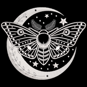 May include: White embroidered design of a moth with detailed wings, set against a crescent moon, stars, and foliage on a black background. The moth has intricate patterns and is the focal point of the design. The overall theme is celestial and mystical.