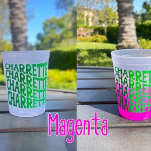 May include: A translucent plastic stadium cup featuring the word CHARRETTE repeated five times in a wavy, stacked green font. The cup on the right shows a vibrant magenta color change at the base, while the cup on the left remains clear.