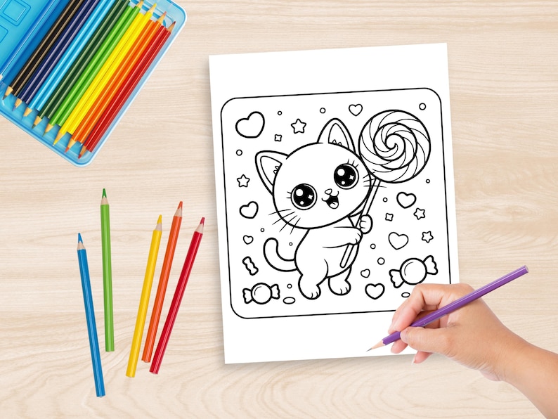 May include: A black and white coloring page featuring a cartoon cat holding a lollipop, surrounded by hearts, stars, and candies. A hand is holding a purple pencil, ready to color the image. Colored pencils in a blue case are visible.