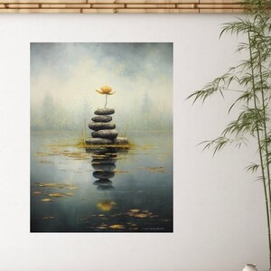 May include: A painting depicting a yellow flower blossoming atop a stack of grey stones in a tranquil body of water. The water reflects the stones and flower. The background features a misty, grey sky.