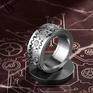 May include: A handmade wooden sign with the text "Welcome to our home" in a handwritten style. The sign is painted white with black lettering and a distressed finish, perfect for home decor.