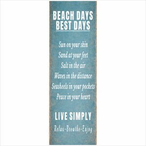close up of beach days best days sign with live simply quote