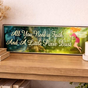 fairy quote sign displayed on wooden console table with candles books and neutral home decor