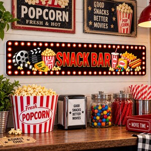 Snack Bar aluminum sign displayed in a home theater concession area with popcorn and movie decor