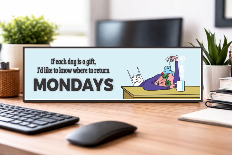 office desk decor sign showing monday humor quote in workspace setting